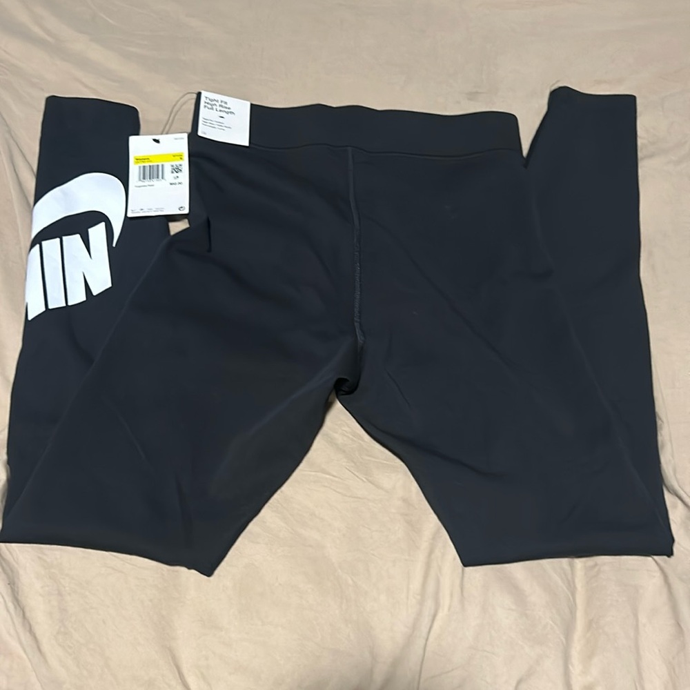 Women’s Nike leggings, black white logo small